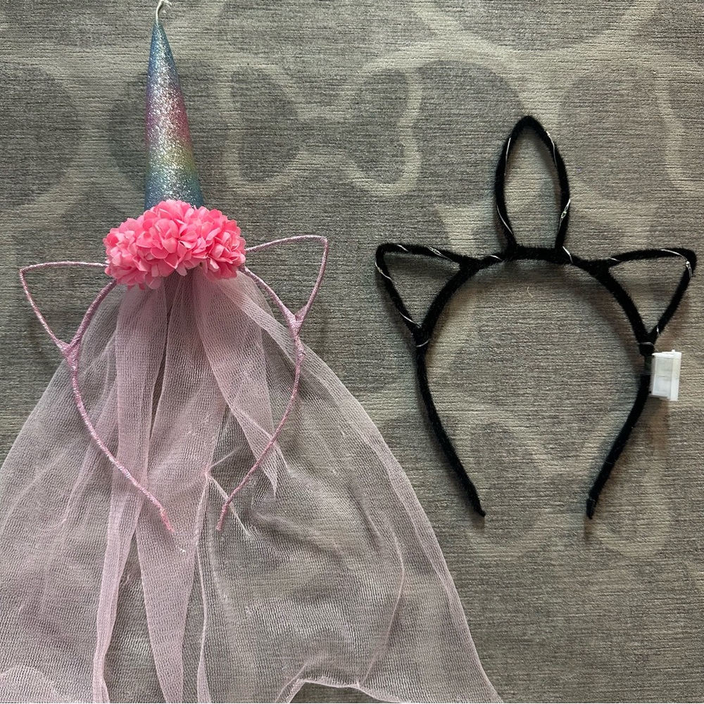 2 Unicorn hairbands. 1 with a veil the other lights up